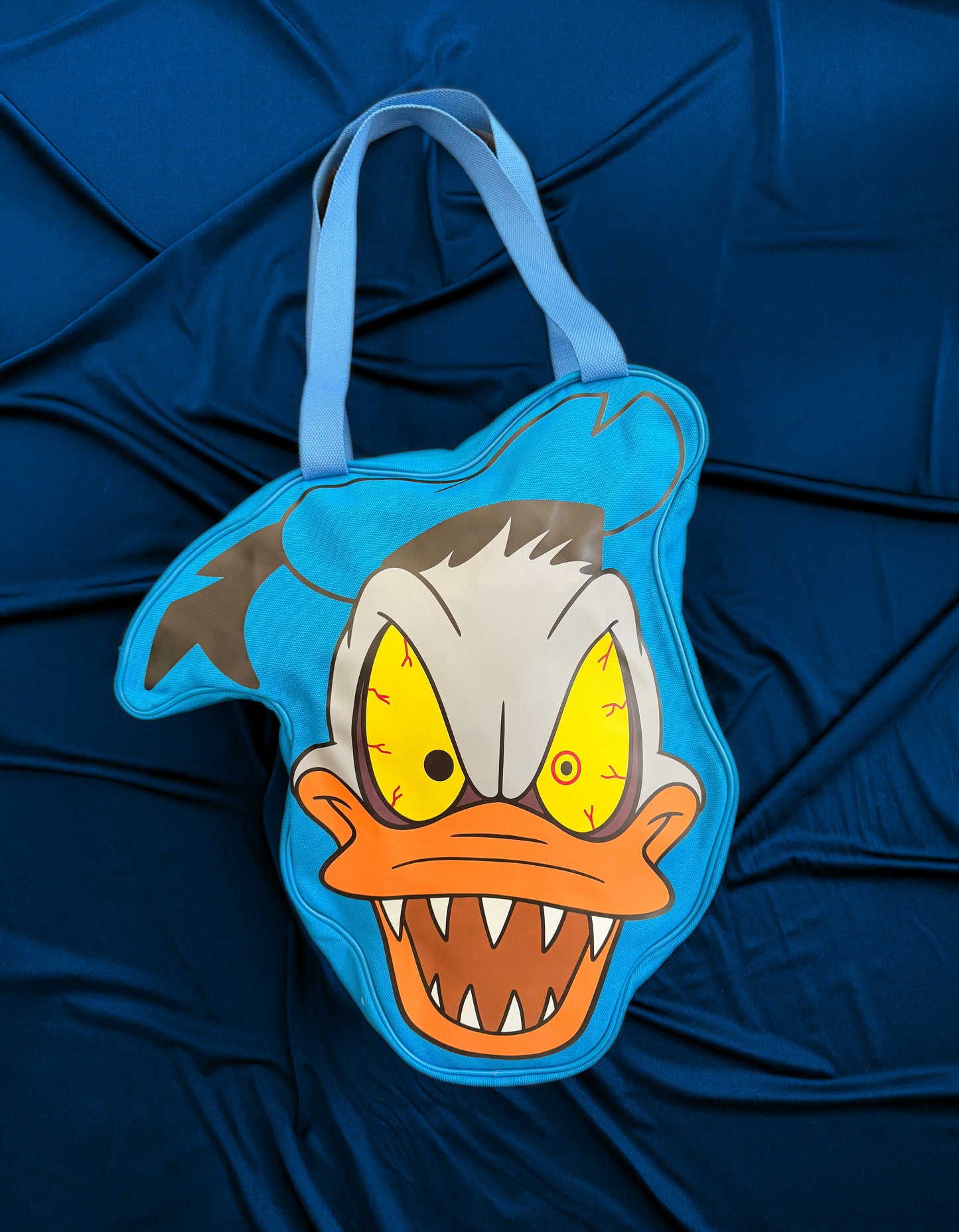 Magically Horrific™ Crashed Out Blue Duck Big Face Zip Tote Bag